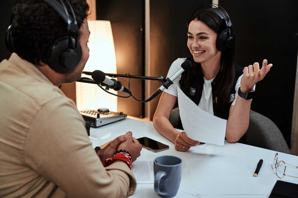 portait-of-happy-female-radio-host-smiling-talkin-2022-09-28-23-30-18-utc.jpg