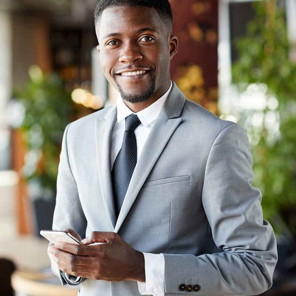 cheerful-young-african-american-businessman-with-s-2022-10-07-00-43-25-utc.jpg