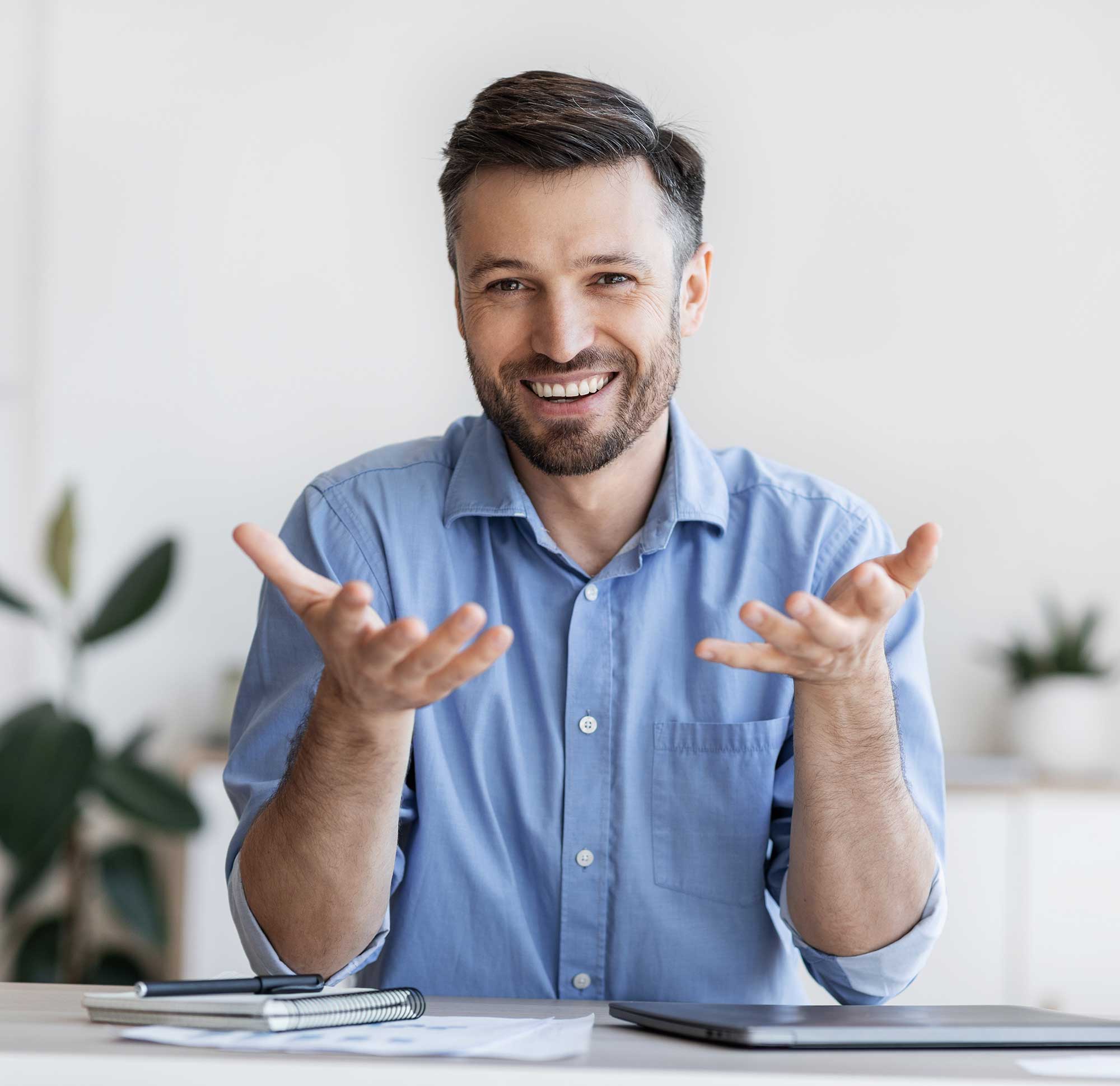 successful-handsome-businessman-sitting-at-desk-in-2022-12-16-07-48-48-utc-2.jpg